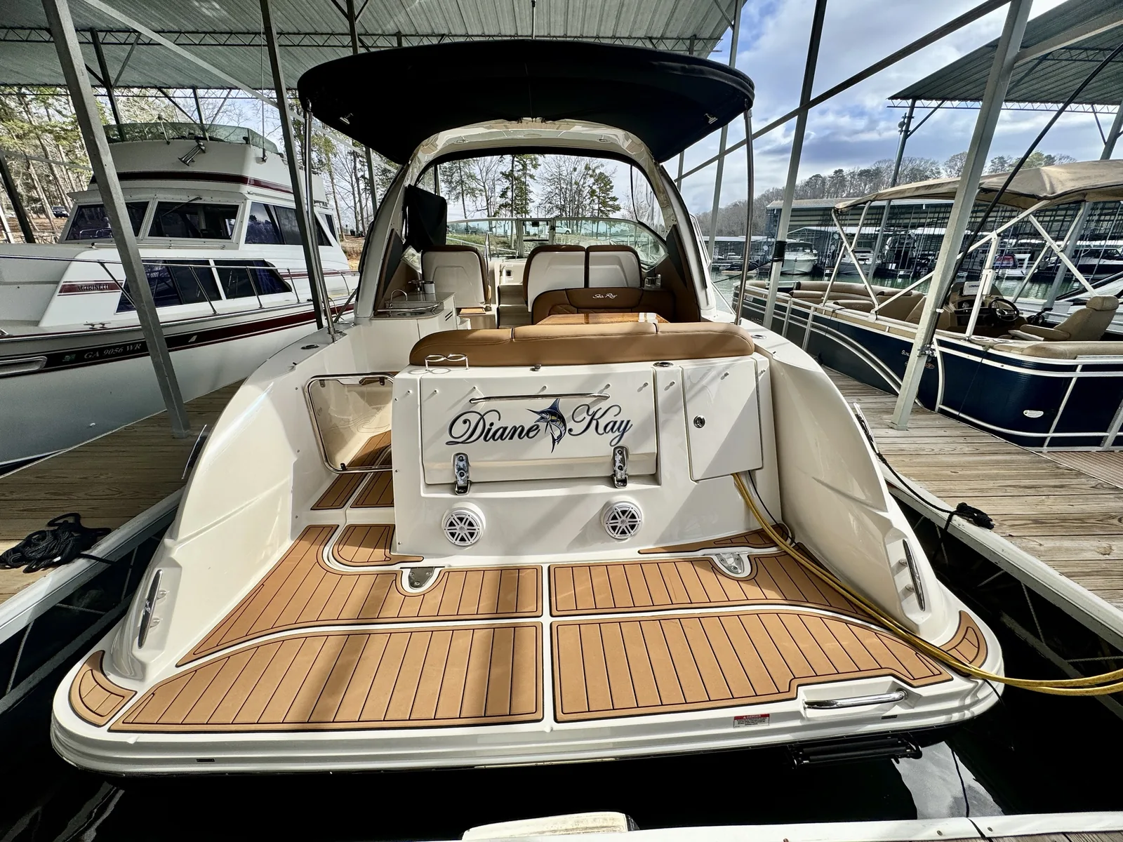 Diane Kay script name with a full-color marlin graphic on a boat transom