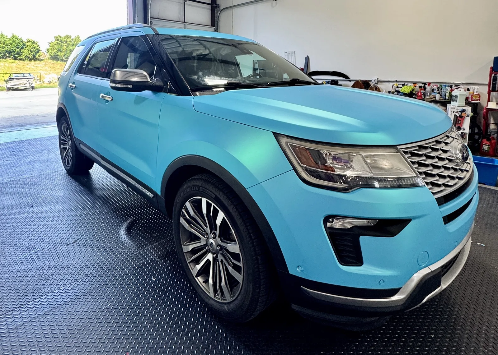 Ford Explorer after a full light blue color-change wrap