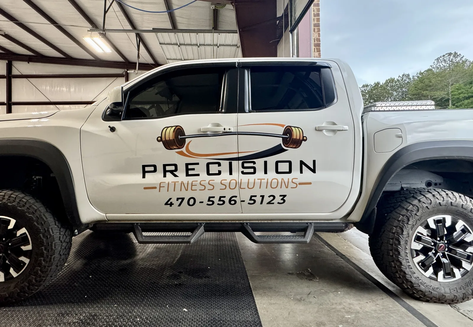 Precision Fitness Solutions pickup with cut-vinyl logo and lettering package