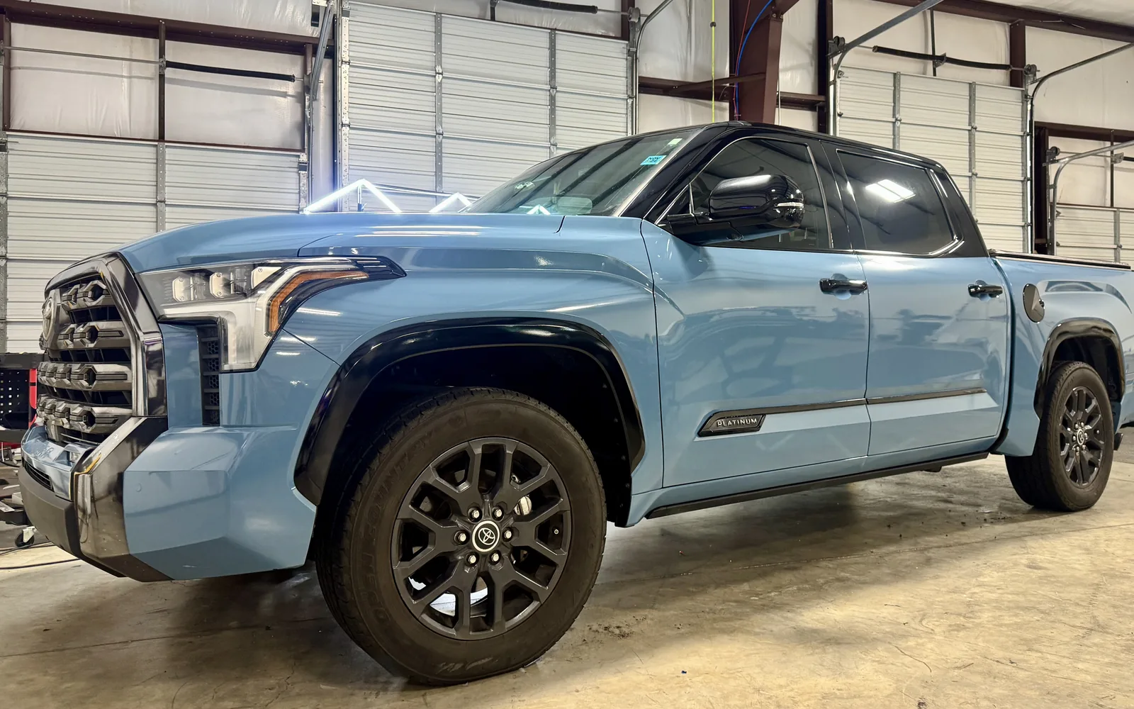 Toyota Tundra full color change wrap in blue with black tuxedo roof and hood